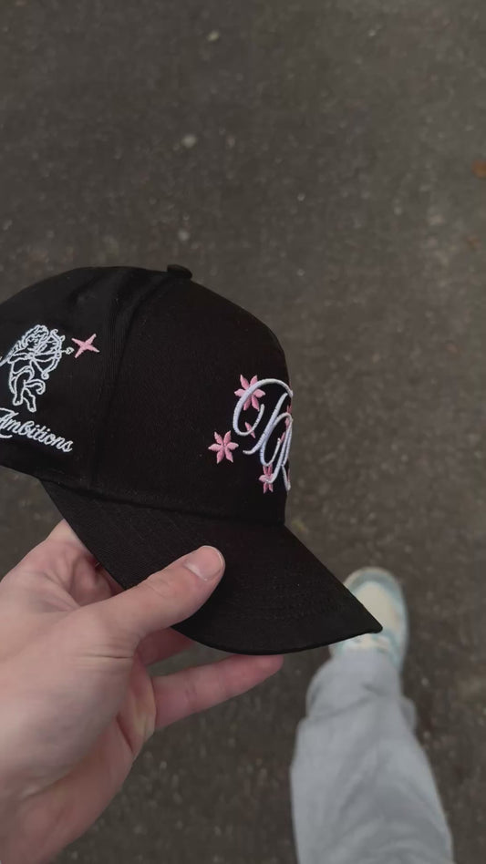 Trayce „Amor“ Cap